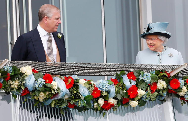 Image: Britain's Queen Elizabeth smiles at the Epsom Derby as she speaks with Prince Andrew in Epsom, south of London